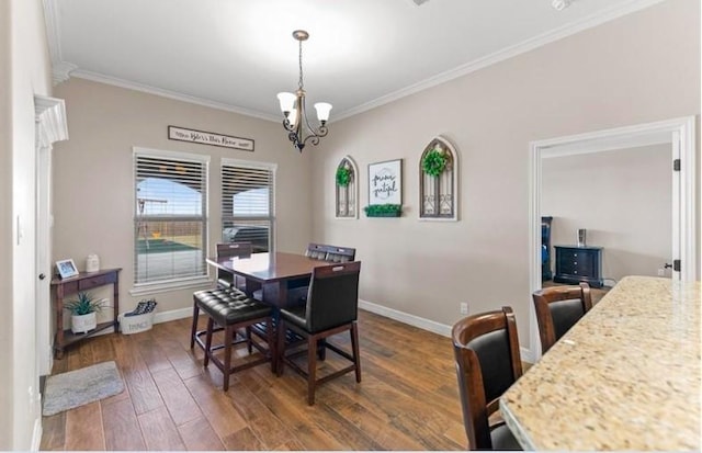 2013 Magnolia Falls Dr, Corpus Christi, TX 78415 - dining area with baseboards, a notable chandelier, wood finished floors, and ornamental molding