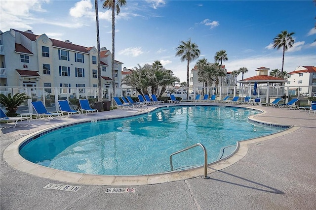 14721 Whitecap Blvd Unit 115, Corpus Christi, TX 78418 - community pool with a patio area