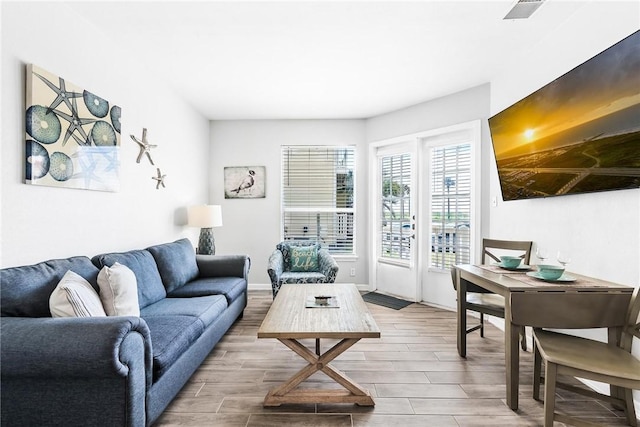 14721 Whitecap Blvd Unit 115, Corpus Christi, TX 78418 - living room with wood finished floors and baseboards