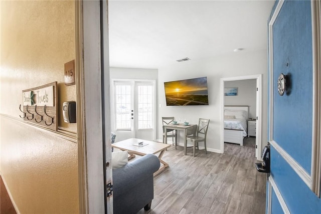 14721 Whitecap Blvd Unit 115, Corpus Christi, TX 78418 - living room featuring wood finished floors and french doors