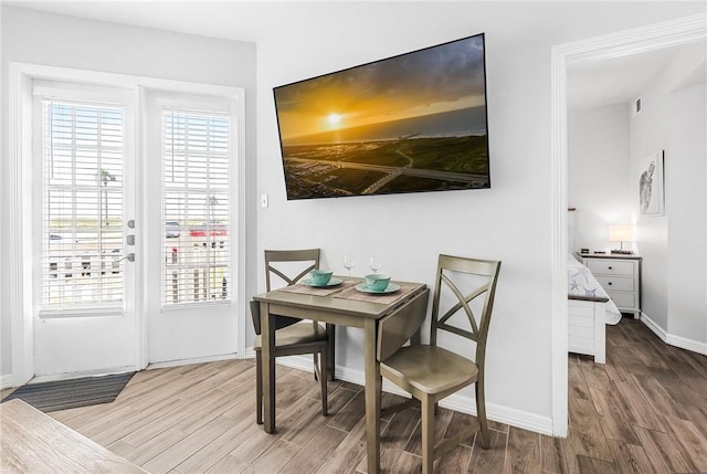 14721 Whitecap Blvd Unit 115, Corpus Christi, TX 78418 - dining room with wood finished floors