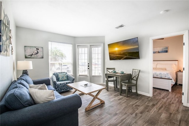 14721 Whitecap Blvd Unit 115, Corpus Christi, TX 78418 - living area with dark wood finished floors and baseboards
