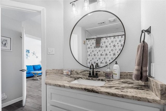 14721 Whitecap Blvd Unit 115, Corpus Christi, TX 78418 - bathroom featuring vanity and baseboards