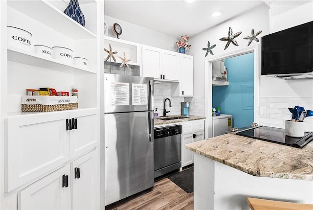 14721 Whitecap Blvd Unit 115, Corpus Christi, TX 78418 - kitchen featuring appliances with stainless steel finishes, open shelves, tasteful backsplash, white cabinets, and recessed lighting