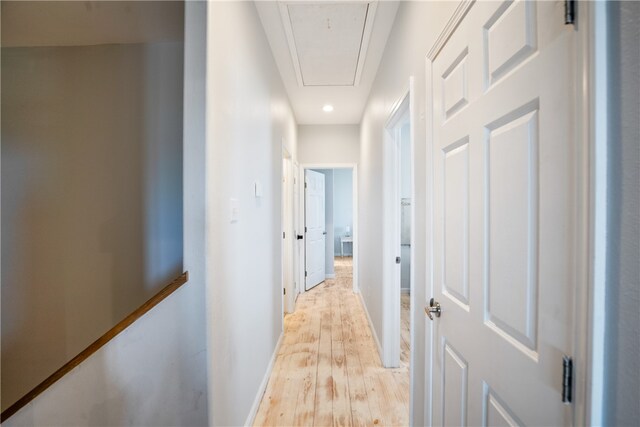 hallway with light wood-type flooring