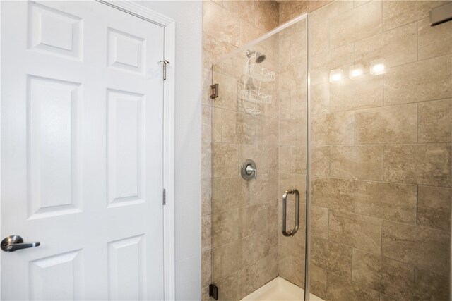 bathroom with an enclosed shower