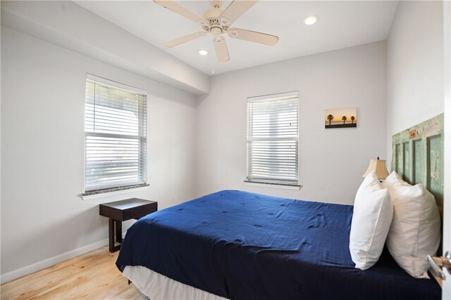 bedroom featuring ceiling fan and light wood-type flooring