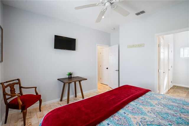 bedroom featuring light wood-type flooring and ceiling fan