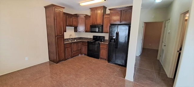 kitchen featuring black appliances and sink