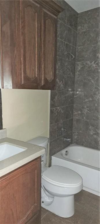 full bathroom with tile patterned floors, shower / washtub combination, vanity, and toilet