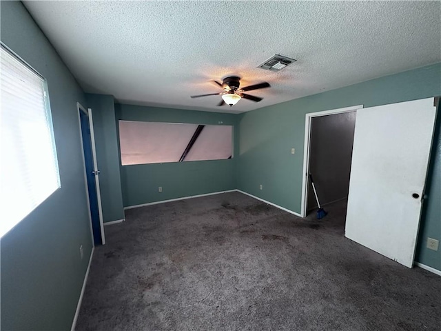 5406 Sugar Creek Dr, Corpus Christi, TX 78413 - unfurnished bedroom with carpet floors, a textured ceiling, and a ceiling fan