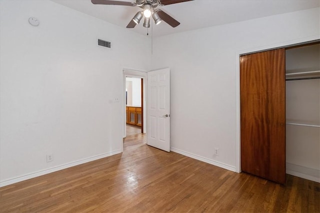 1009 Driftwood Pl, Corpus Christi, TX 78411 - unfurnished bedroom with wood finished floors, a closet, and ceiling fan
