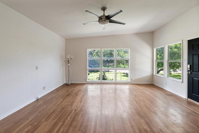 1009 Driftwood Pl, Corpus Christi, TX 78411 - unfurnished living room with wood finished floors and a ceiling fan