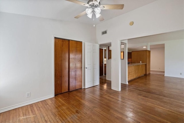 1009 Driftwood Pl, Corpus Christi, TX 78411 - unfurnished bedroom featuring hardwood / wood-style flooring, lofted ceiling, and a ceiling fan