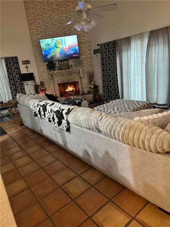 4410 Hebert, Corpus Christi, TX 78413 - living area with a fireplace, a ceiling fan, and tile patterned flooring