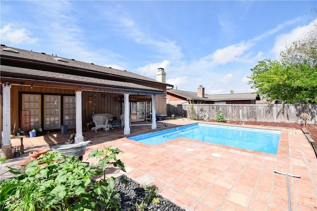 4410 Hebert, Corpus Christi, TX 78413 - view of swimming pool featuring a patio, french doors, a fenced backyard, and a fenced in pool