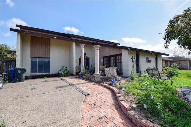4410 Hebert, Corpus Christi, TX 78413 - back of house featuring a patio area and brick siding