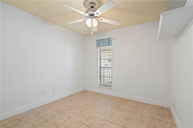 3101 Sylvan Crest Dr, Corpus Christi, TX 78415 - empty room with a ceiling fan, a textured ceiling, and light tile patterned flooring