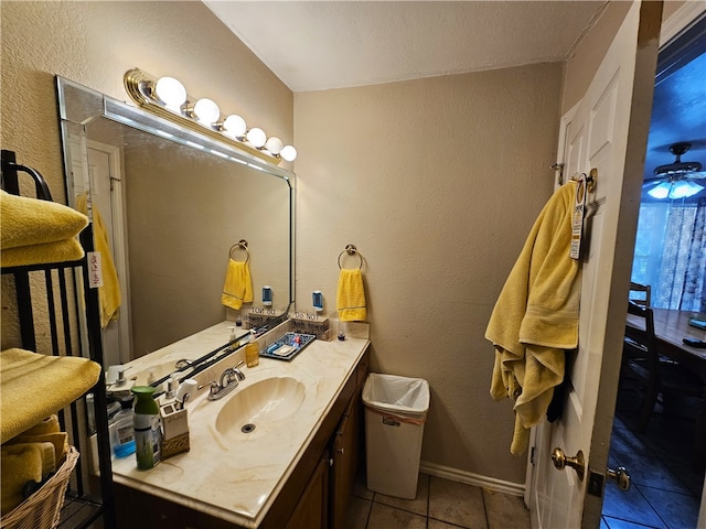 bathroom with ceiling fan, vanity, and tile patterned floors