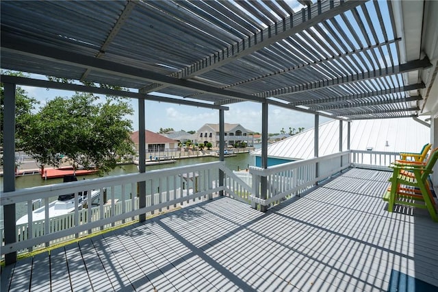 109 Tarpon Ct, Aransas Pass, TX 78336 - deck featuring a water view, a pergola, a boat dock, and a residential view