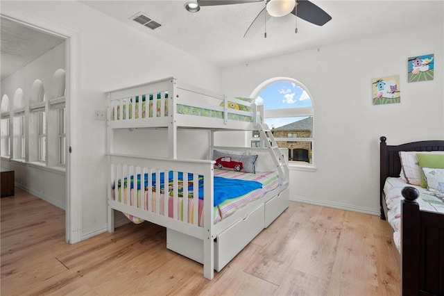 109 Tarpon Ct, Aransas Pass, TX 78336 - bedroom featuring wood finished floors, ceiling fan, and baseboards