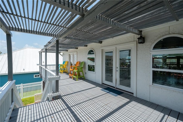 109 Tarpon Ct, Aransas Pass, TX 78336 - wooden deck with french doors and a pergola
