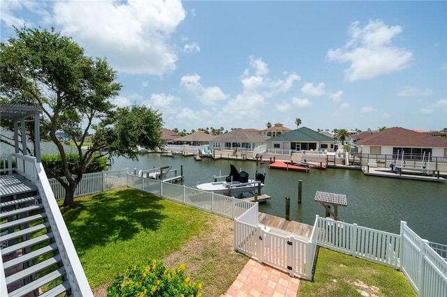 109 Tarpon Ct, Aransas Pass, TX 78336 - dock area with a water view, a residential view, and a gate