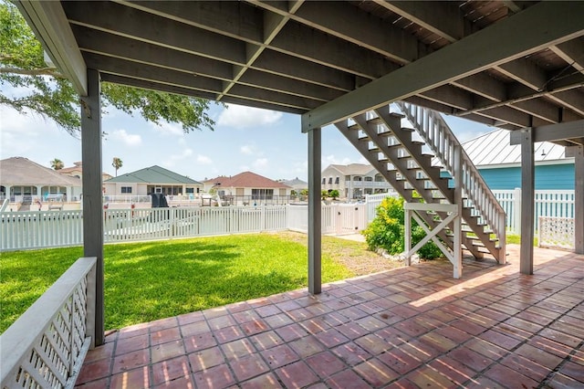 109 Tarpon Ct, Aransas Pass, TX 78336 - view of patio featuring stairway and a residential view