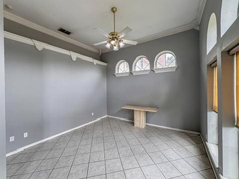 4513 Ammer Lake Dr, Corpus Christi, TX 78413 - spare room featuring ornamental molding, ceiling fan, and light tile patterned flooring