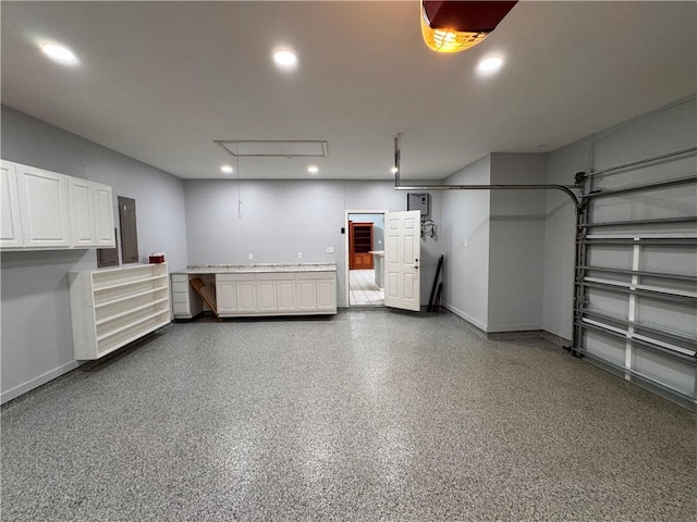 4513 Ammer Lake Dr, Corpus Christi, TX 78413 - garage featuring baseboards and recessed lighting