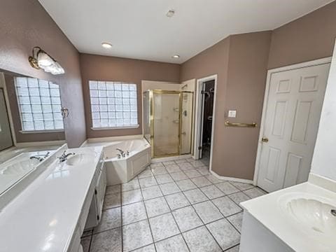 4513 Ammer Lake Dr, Corpus Christi, TX 78413 - full bath with vanity, a shower stall, a garden tub, and tile patterned floors