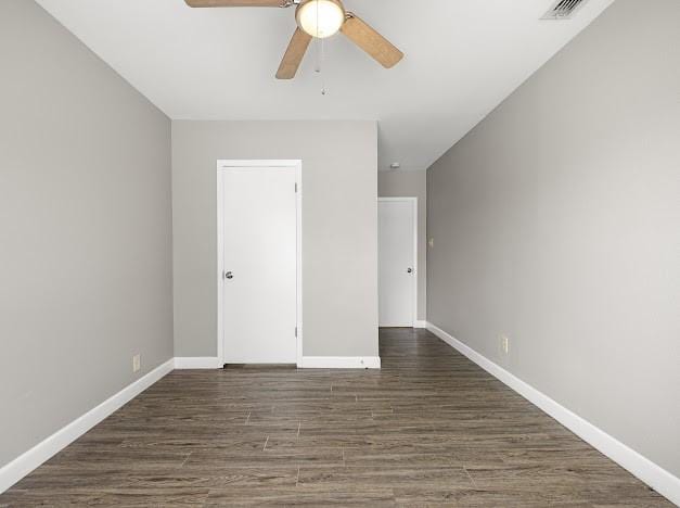 6022 Norvel Dr, Corpus Christi, TX 78412 - unfurnished bedroom with wood finished floors and ceiling fan