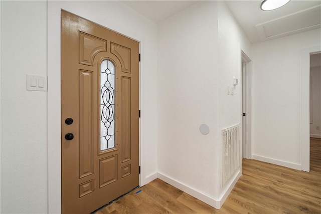 2442 Bevecrest Dr, Corpus Christi, TX 78415 - entryway featuring baseboards, light wood-style floors, and visible vents