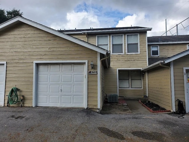 4401 River Valley Dr Unit 503, Corpus Christi, TX 78410 - view of front of property featuring driveway and an attached garage