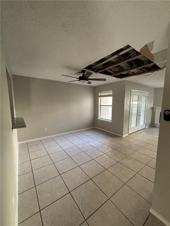 4401 River Valley Dr Unit 503, Corpus Christi, TX 78410 - unfurnished room with light tile patterned floors, a textured ceiling, and ceiling fan