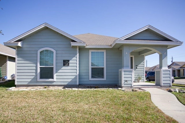 view of front of home with a front yard