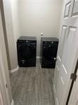 washroom featuring washer and dryer