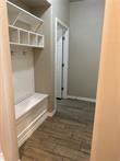 mudroom featuring dark hardwood / wood-style floors