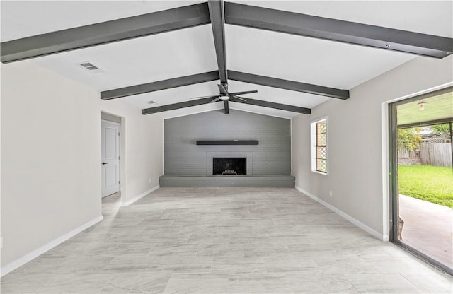 5611 Nelson, Corpus Christi, TX 78411 - unfurnished living room with a ceiling fan, healthy amount of natural light, and a large fireplace