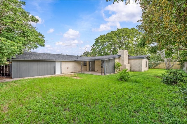 5611 Nelson, Corpus Christi, TX 78411 - rear view of property with a patio and a chimney