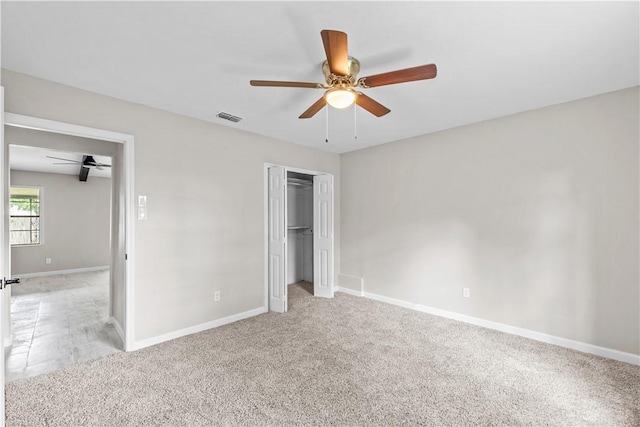 5611 Nelson, Corpus Christi, TX 78411 - unfurnished bedroom with light colored carpet, a closet, and a ceiling fan