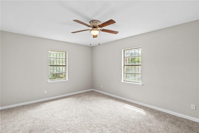 5611 Nelson, Corpus Christi, TX 78411 - spare room with plenty of natural light, a ceiling fan, and carpet flooring