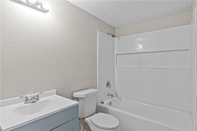 5611 Nelson, Corpus Christi, TX 78411 - bathroom featuring a textured wall, bathing tub / shower combination, and vanity