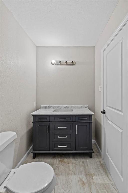 5611 Nelson, Corpus Christi, TX 78411 - bathroom with vanity and wood finished floors