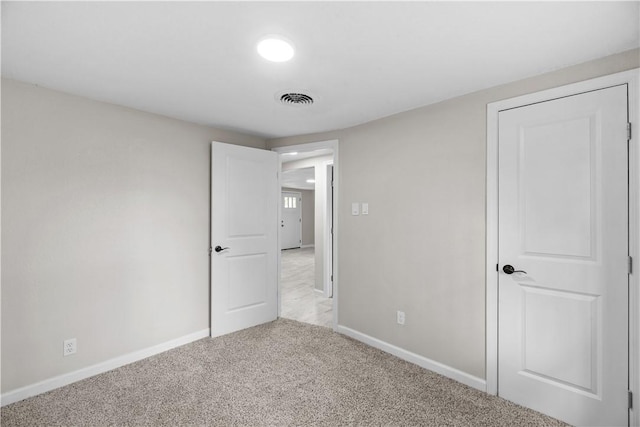 5611 Nelson, Corpus Christi, TX 78411 - unfurnished bedroom featuring carpet and baseboards