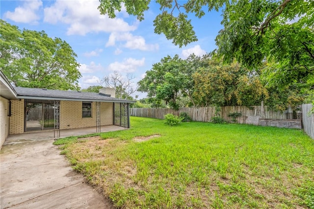 5611 Nelson, Corpus Christi, TX 78411 - fenced backyard featuring a patio
