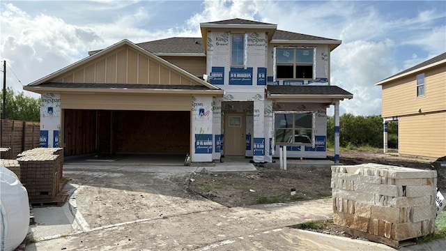 3402 Tanzanite Dr, Corpus Christi, TX 78414 - property under construction with roof with shingles, concrete driveway, an attached garage, and board and batten siding