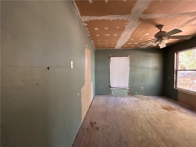 unfurnished room featuring ceiling fan