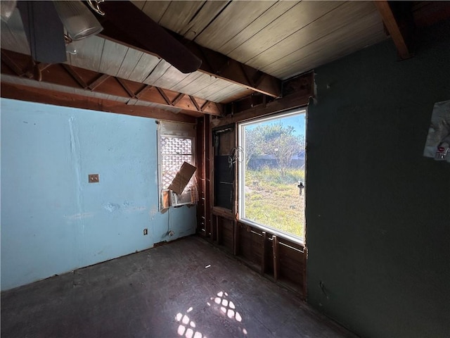 interior space featuring beamed ceiling