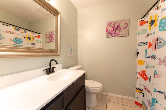 bathroom featuring vanity, toilet, tile patterned floors, and curtained shower